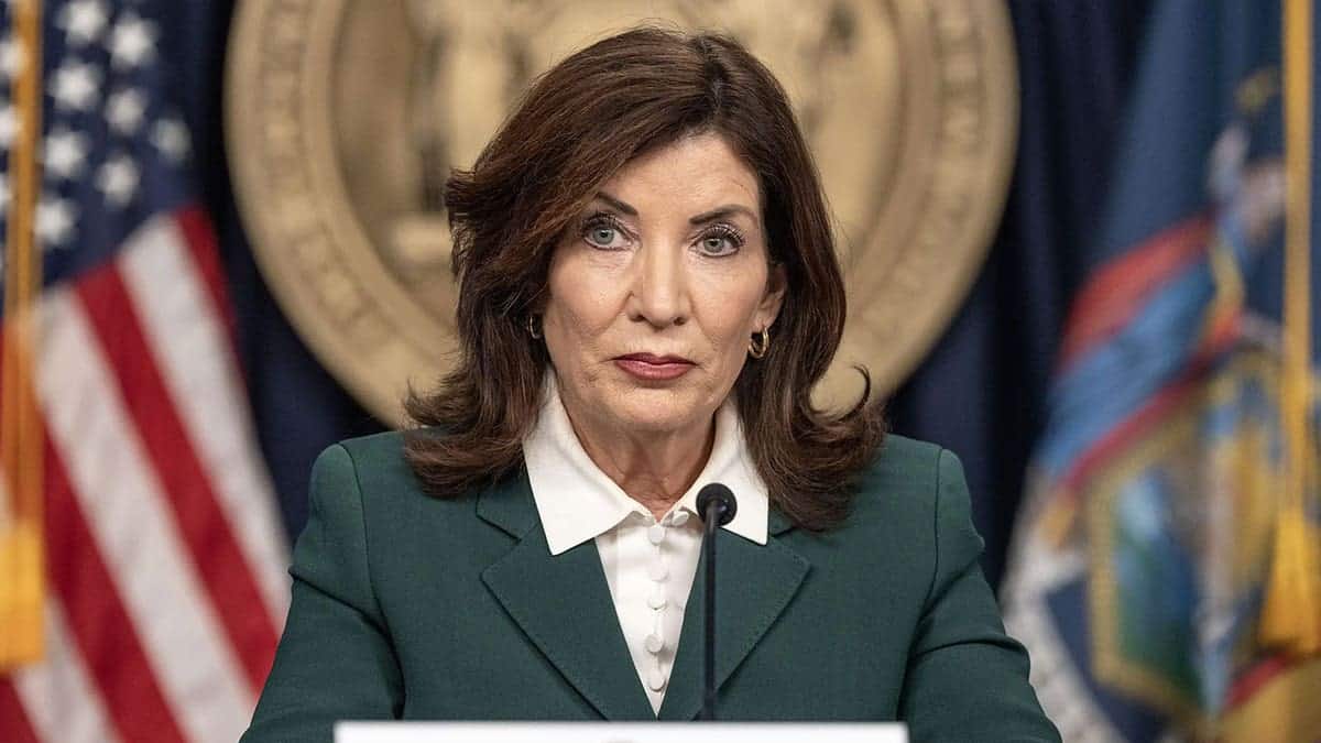 New York Gov. Kathy Hochul speaking at a press conference indoors