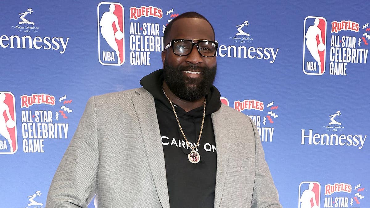 Kendrick Perkins standing on basketball court at NBA All-Star Celebrity Game