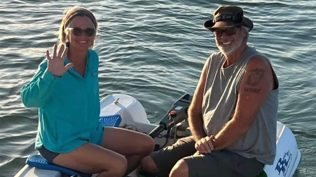 Brian and Lynette Hooker on dinghy