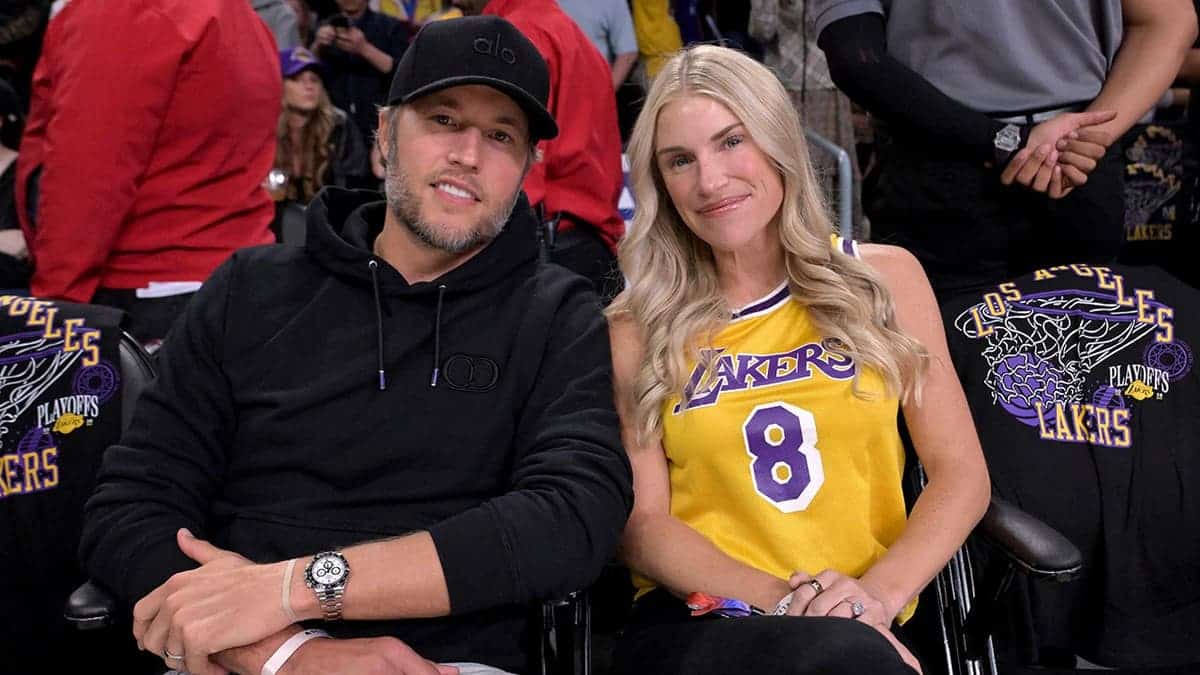 Los Angeles Rams quarterback Matthew Stafford and his wife Kelly seated at a basketball game