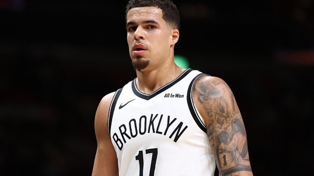 Michael Porter Jr. of the Brooklyn Nets looking on during a basketball game against the Miami Heat at Kaseya Center