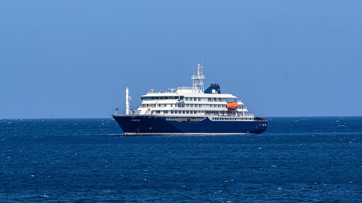 The cruise ship MV Hondius stationary off the port of Praia in Cape Verde