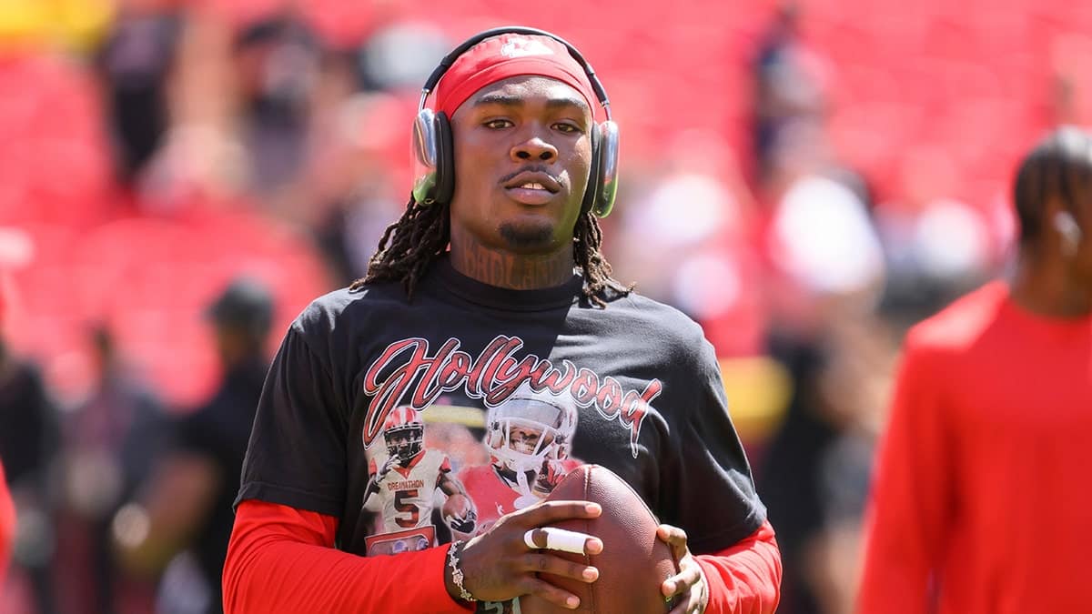 Kansas City Chiefs wide receiver Rashee Rice warming up on the field.