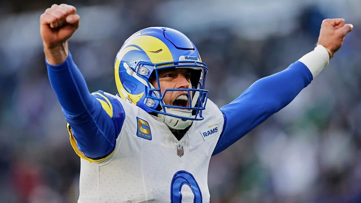 Los Angeles Rams quarterback Matthew Stafford throwing a football during a game.