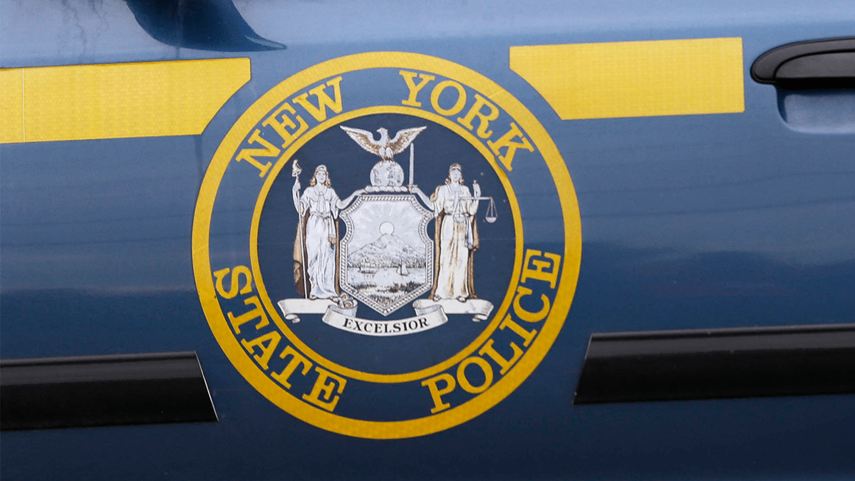 New York State Police logo on a police car near Dannemora New York