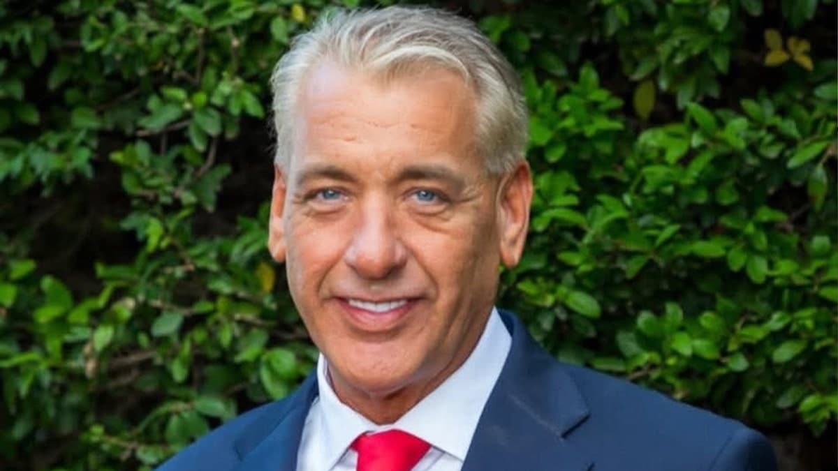 Oklahoma state senate candidate standing outdoors in a suit and tie