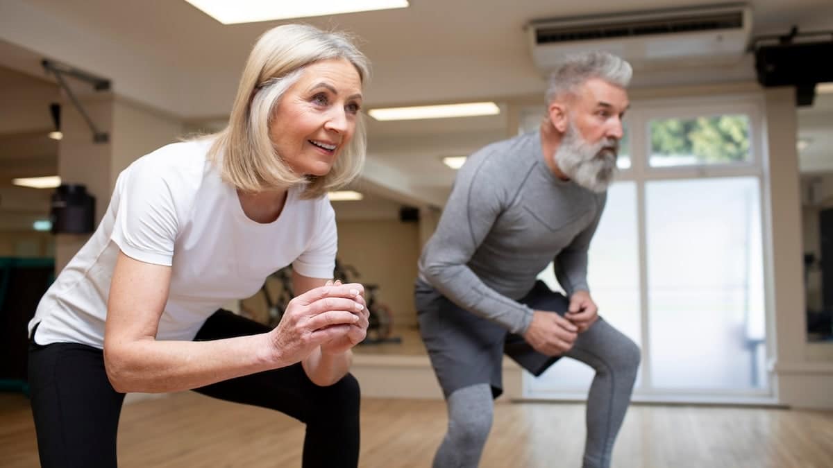 Older couple working out together