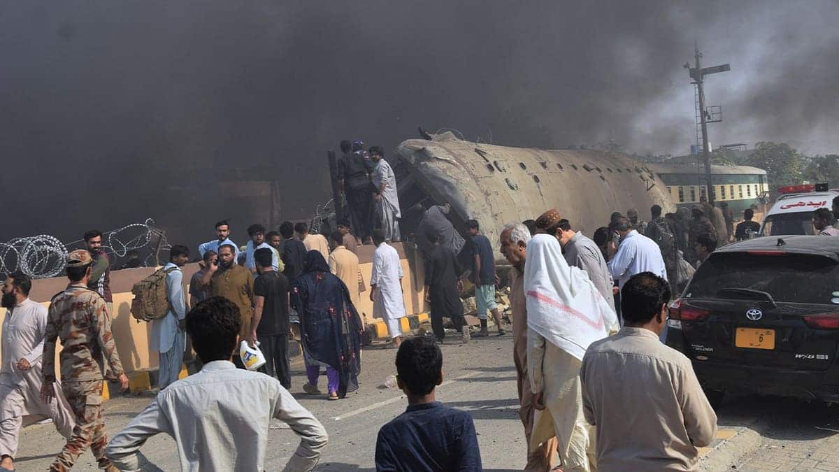 Crowds gather near derailed train