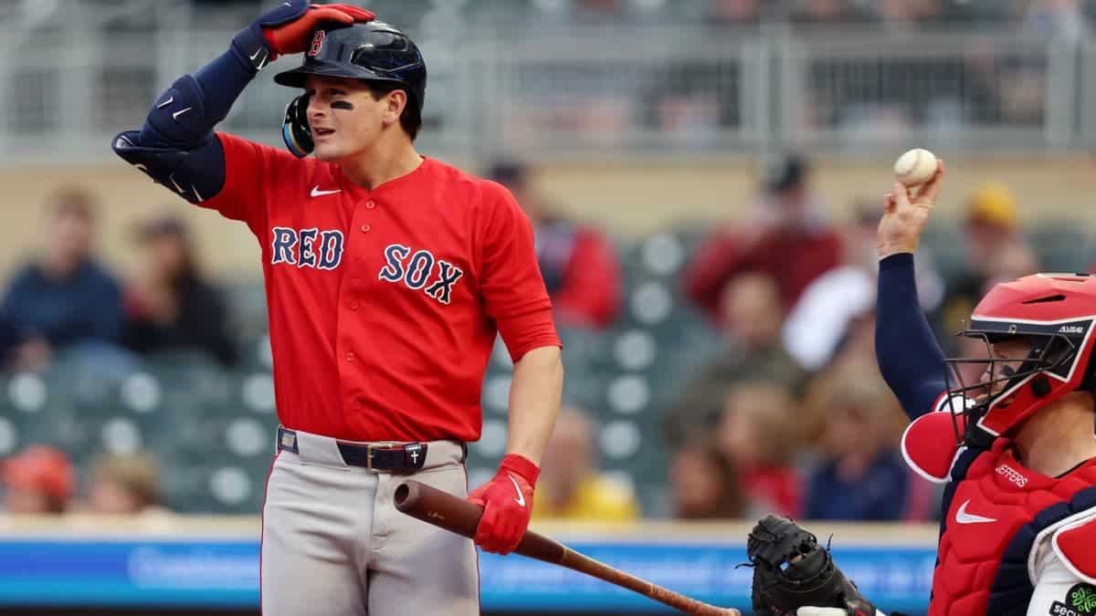 Roman Anthony of the Boston Red Sox taps his helmet during a game at Target Field in Minneapolis
