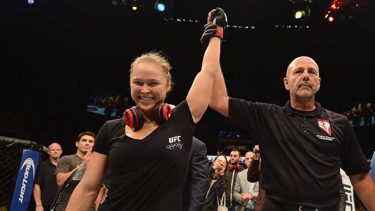 Ronda Rousey celebrating victory inside Mandalay Bay Events Center