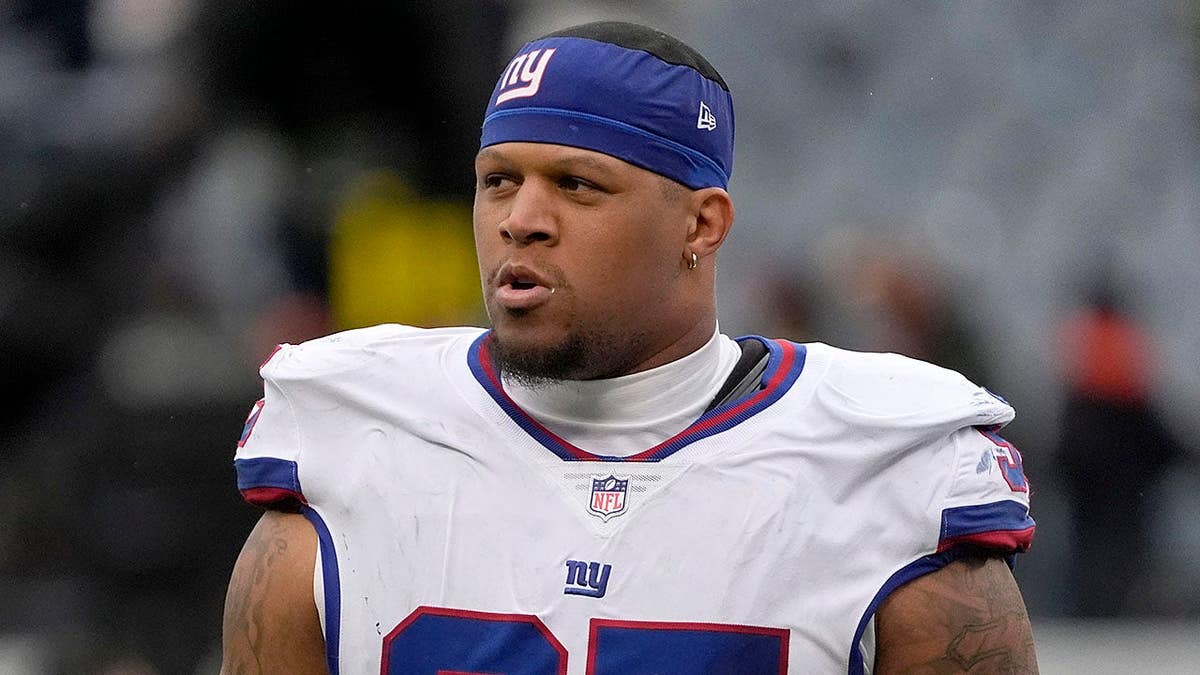 New York Giants defensive tackle Roy Robertson-Harris walking off the field at Soldier Field