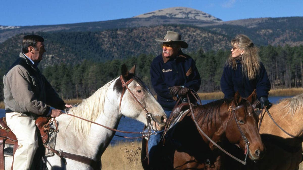 Sam Donaldson standing with Ted Turner and Jane Fonda