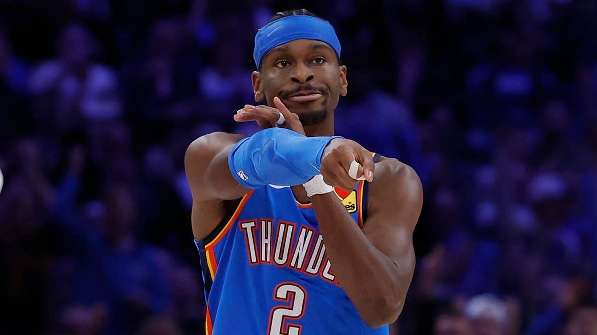 Oklahoma City Thunder guard Shai Gilgeous-Alexander gestures after scoring a basket at Paycom Center