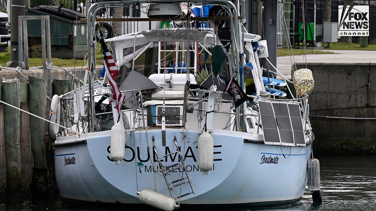 The yacht Soulmate moored at a U.S. Coast Guard station dock.