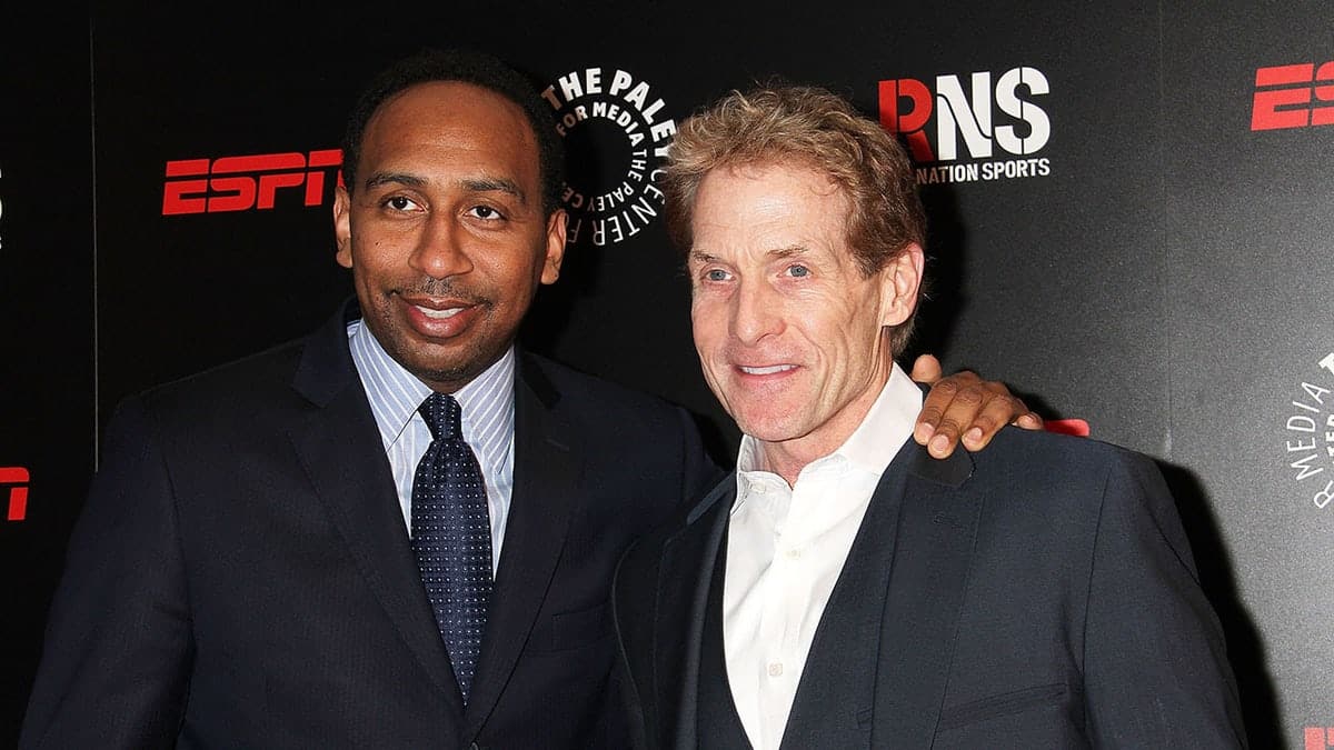 Stephen A. Smith and Skip Bayless standing together at an event in New York City