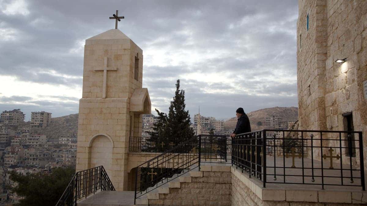 Christians gathered inside the Monastery of Our Lady of Saydnaya celebrating Christmas