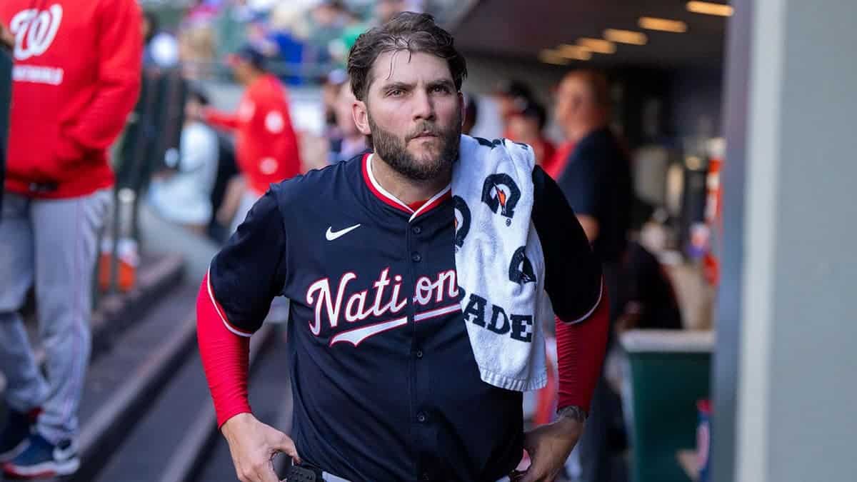 Trevor Williams of the Washington Nationals sitting in the dugout.