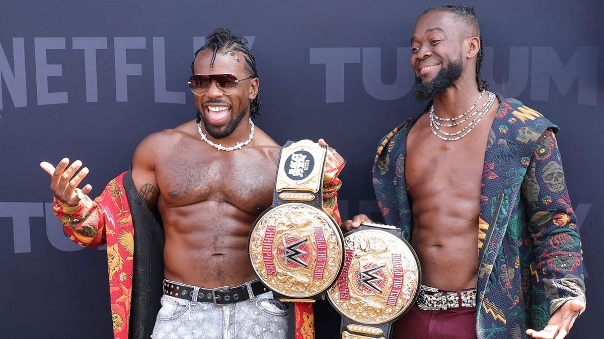 Xavier Woods and Kofi Kingston standing together at Netflix Tudum live event in Inglewood California