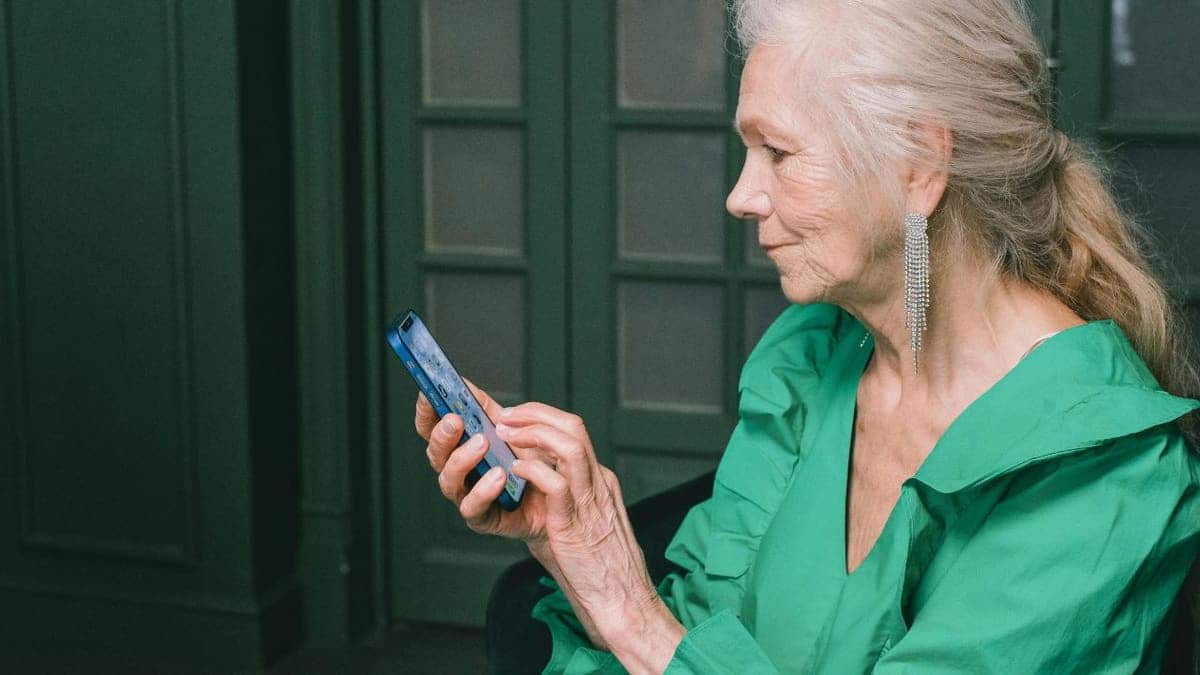 A woman scrolling on her cellphone