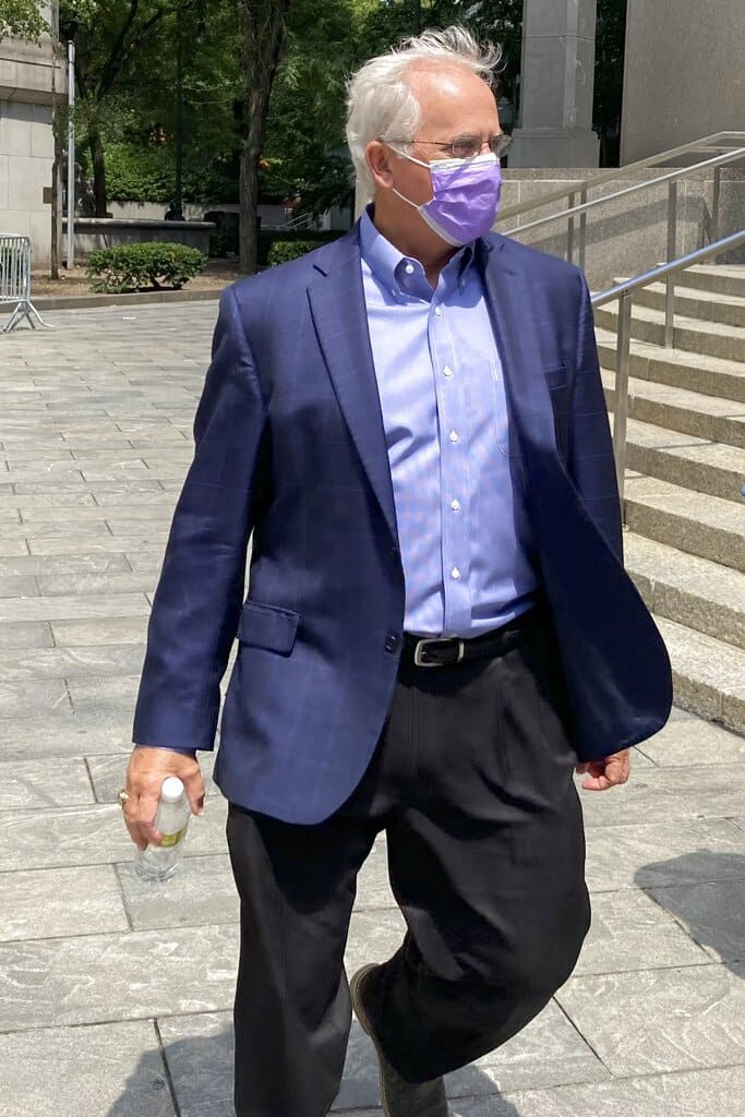 Former U.S. Rep. Stephen Buyer leaves Manhattan federal court after pleading not guilty to charges that he participated in an insider trading scheme while working as a consultant, Wednesday July 27, 2022, in New York. Buyer, who served in Congress from Indiana from 1993 through 2011, will be free on $250,000 bail while the case against him proceeds.