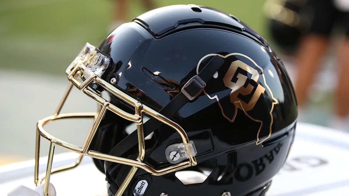 Colorado Buffs helmet resting on the sidelines at Mountain America Stadium