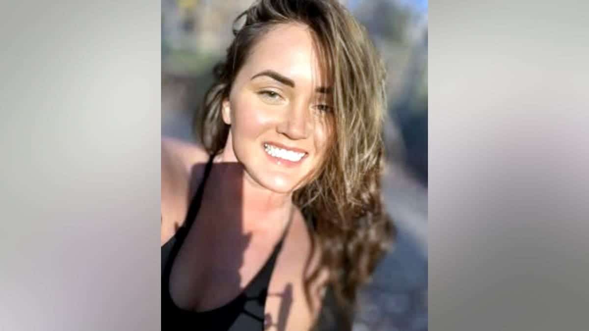 Elena Katherine Moore smiling in a photo