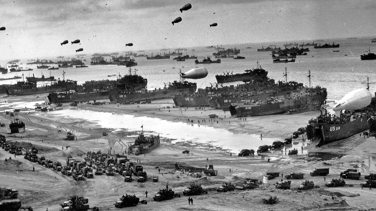 D-Day landing craft and boats transporting infantry and vehicles during amphibious assault