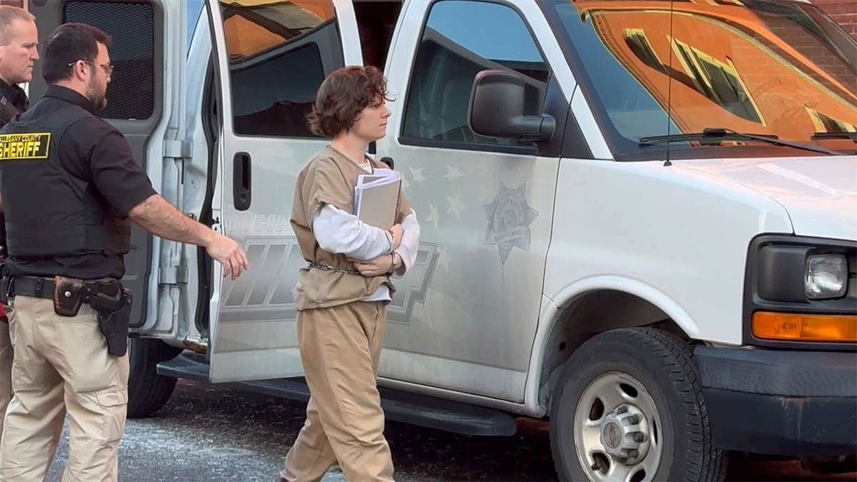 Michelle Zajko is escorted into a courthouse for a pretrial hearing in Cumberland, Maryland, on Jan. 16, 2026.