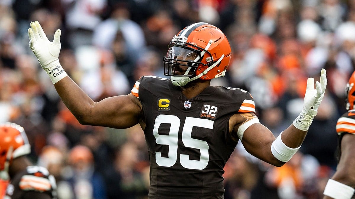 Myles Garrett celebrating on the field at Cleveland Browns Stadium