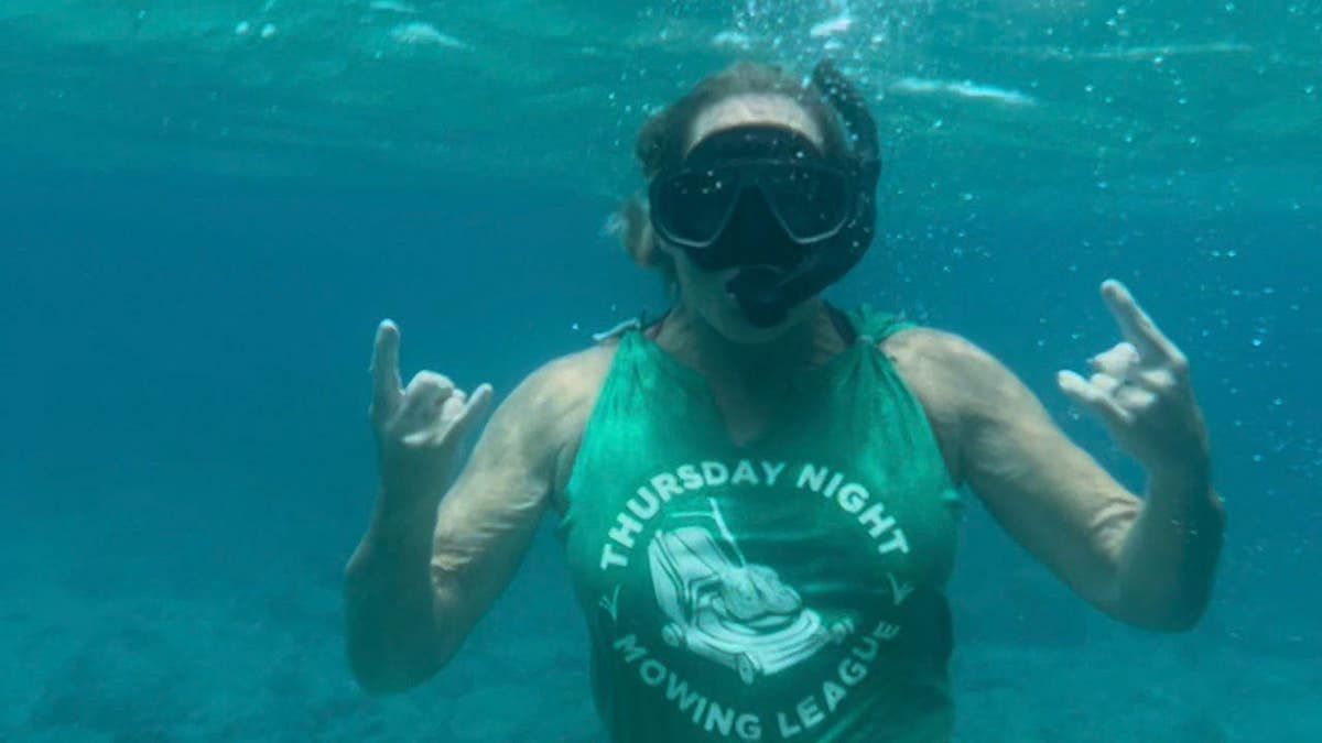 Thursday Night Mowing League member Suzanne in Texas in her TNML on a summer vacation.