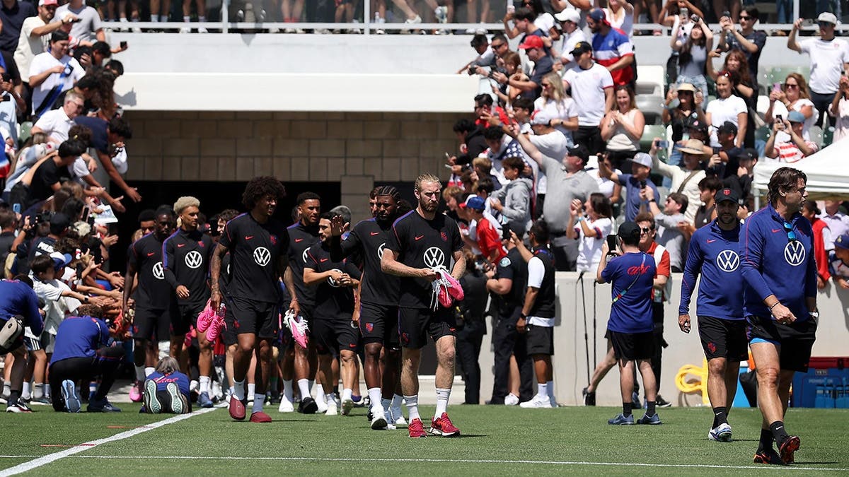 The U.S. men's team walks onto the field at Irvine Sports Complex.