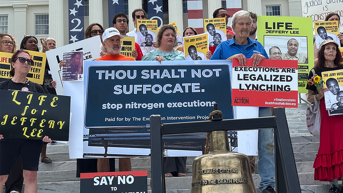 Protesters gather to oppose an upcoming execution in Alabama