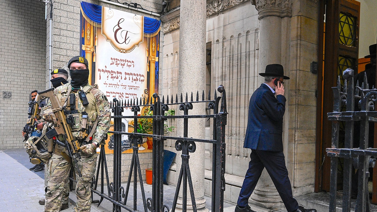 Armed guards outside synagogue in Belgium.