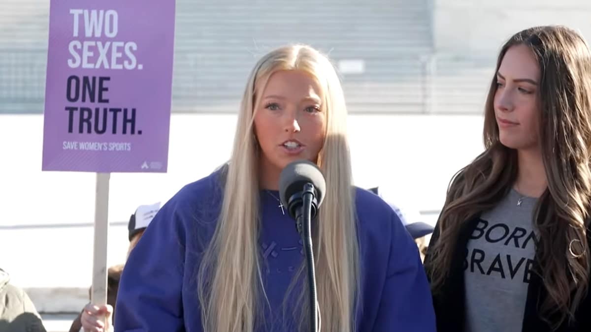 Brooke Slusser speaking outside the U.S. Supreme Court with Kaylie Ray standing beside her