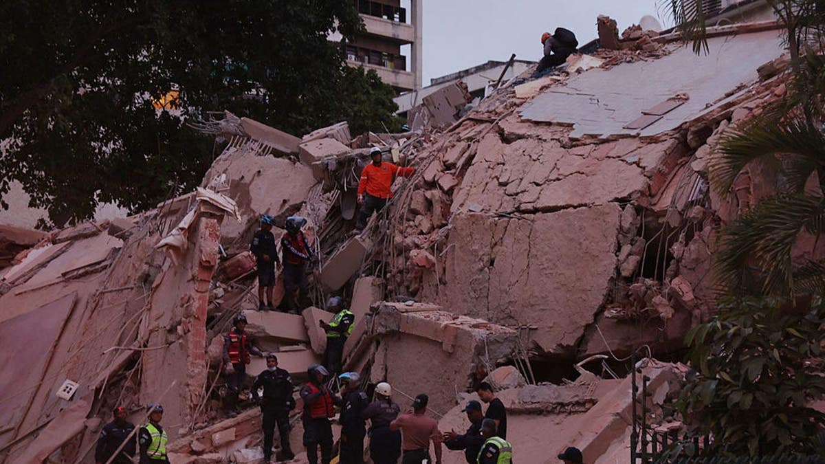 First responders attending a damaged building in Caracas, Venezuela after an earthquake.