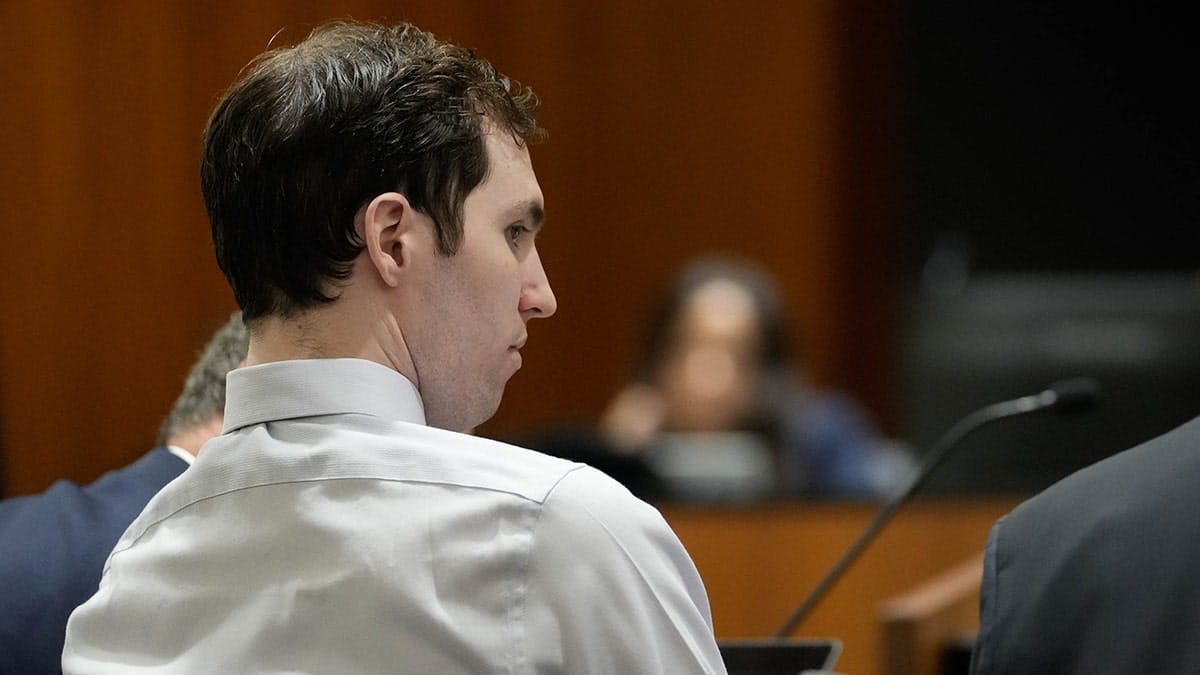 Tyler Robinson standing in a courtroom during a hearing in Provo, Utah