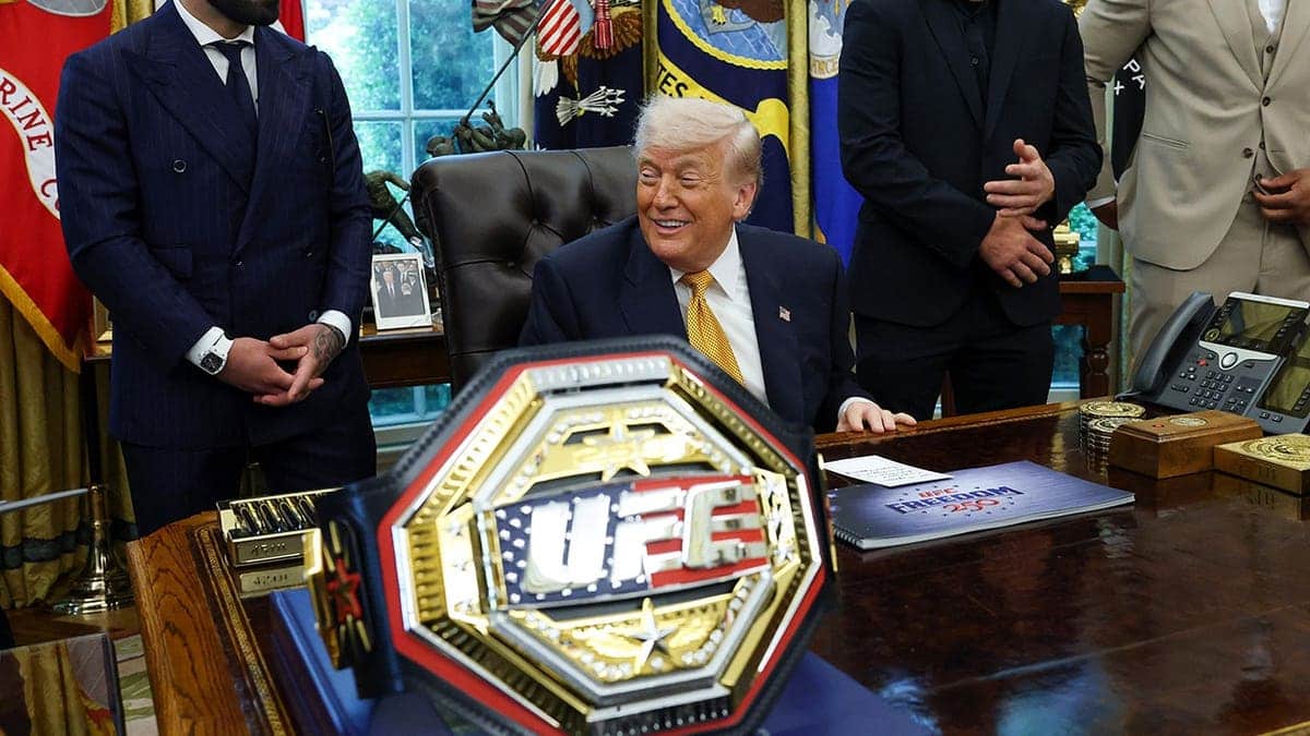 U.S. President Donald Trump standing with UFC fighters Ilia Topuria, Justin Gaethje, and Ciryl Gane in the Oval Office