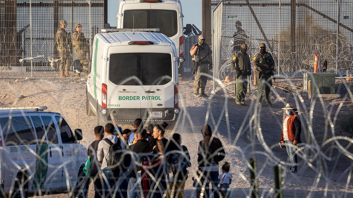 U.S. Border Patrol vehicles transporting groups of immigrants in El Paso Texas