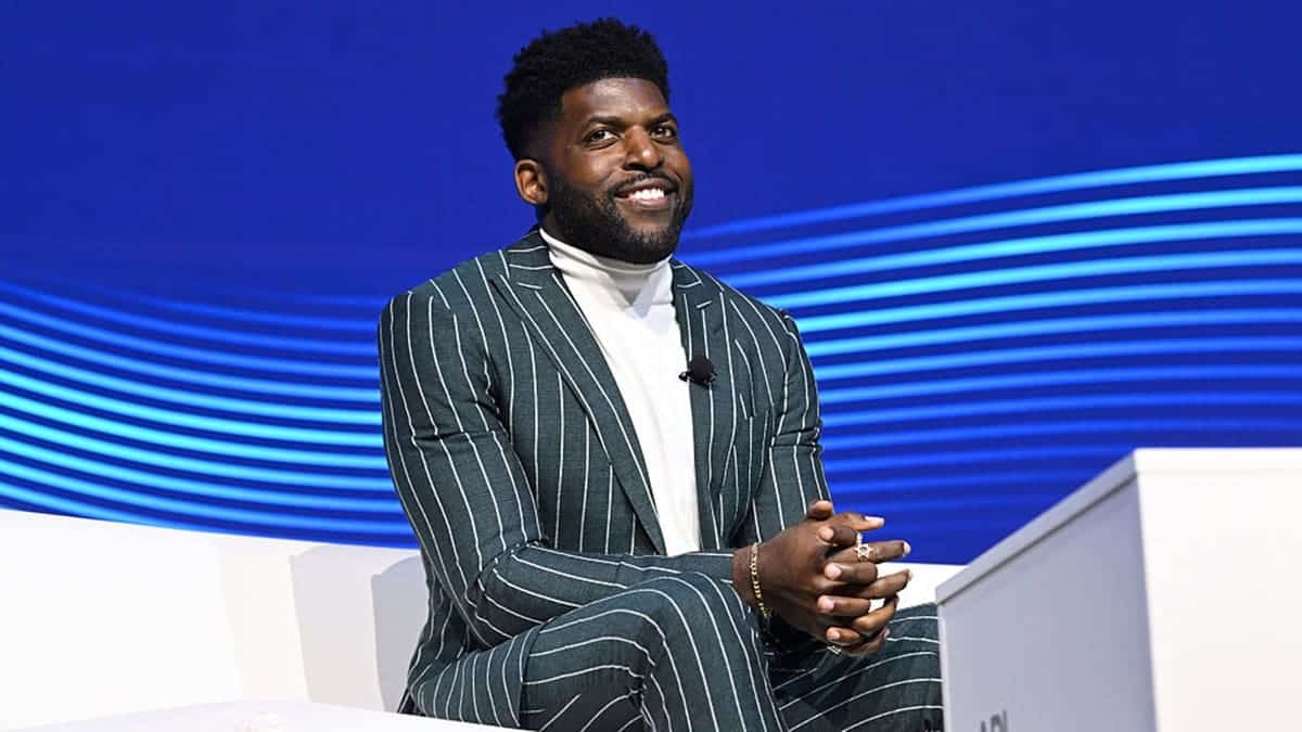Emmanuel Acho speaking onstage at the ADL Never Is Now Summit in New York City