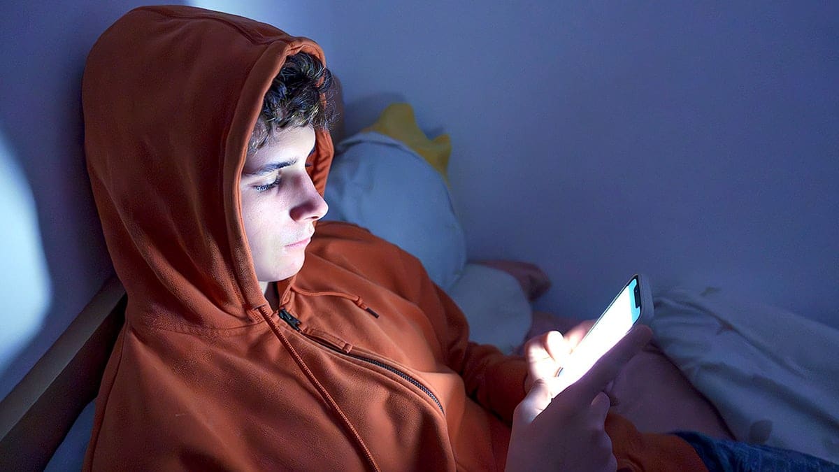 teen boy on a smartphone
