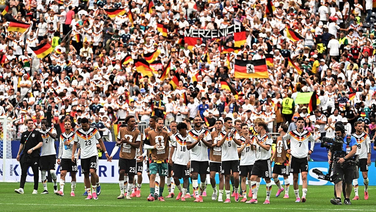 Germany players celebrating on the field in Houston, Texas