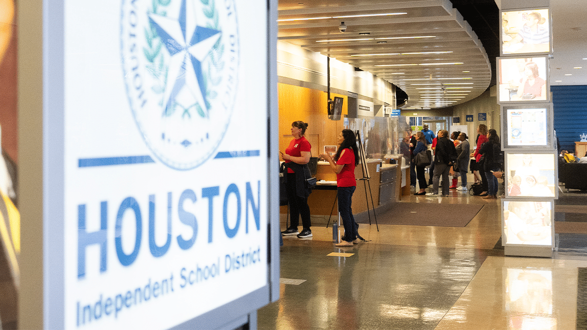 Houston Independent School District logo on a sign.