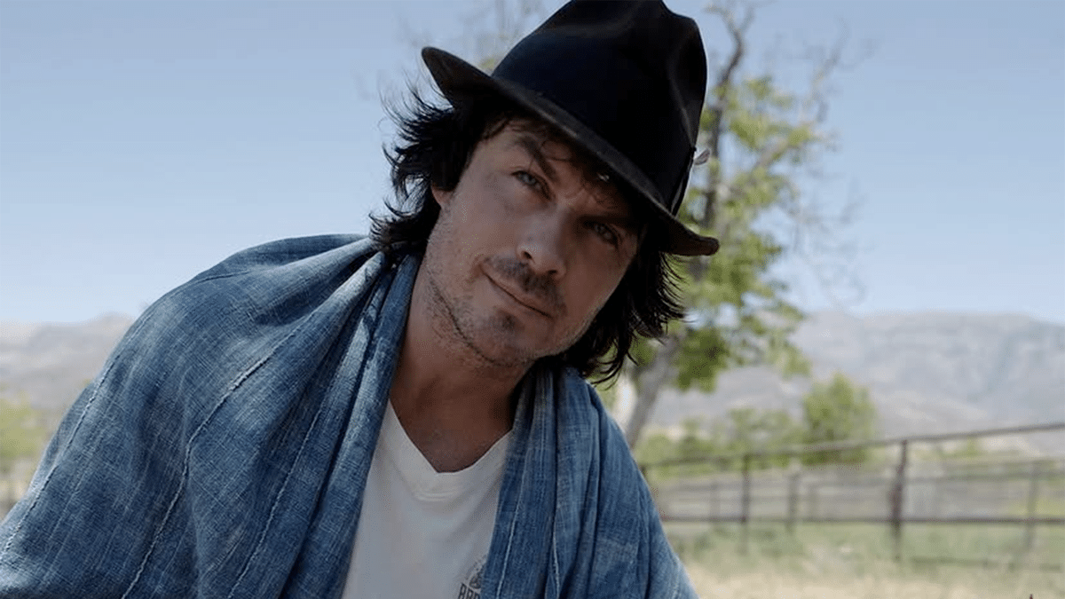 A closeup of Ian Somerhalder on a farm