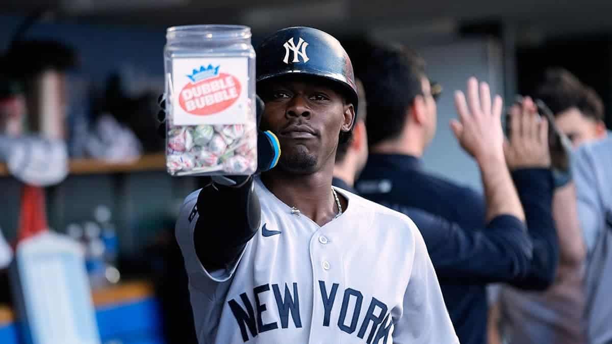 New York Yankees' Jazz Chisholm Jr. celebrating after hitting a home run during a baseball game.