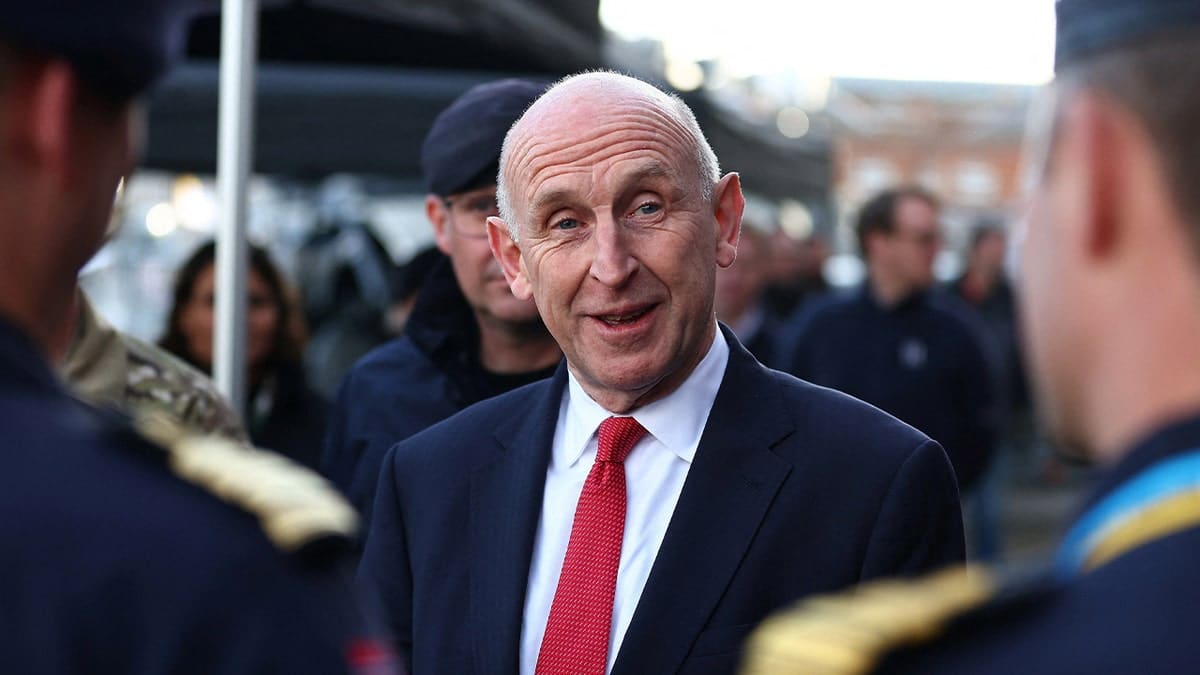 Britain's Defence Secretary John Healey speaking with British and Norwegian naval personnel in Portsmouth