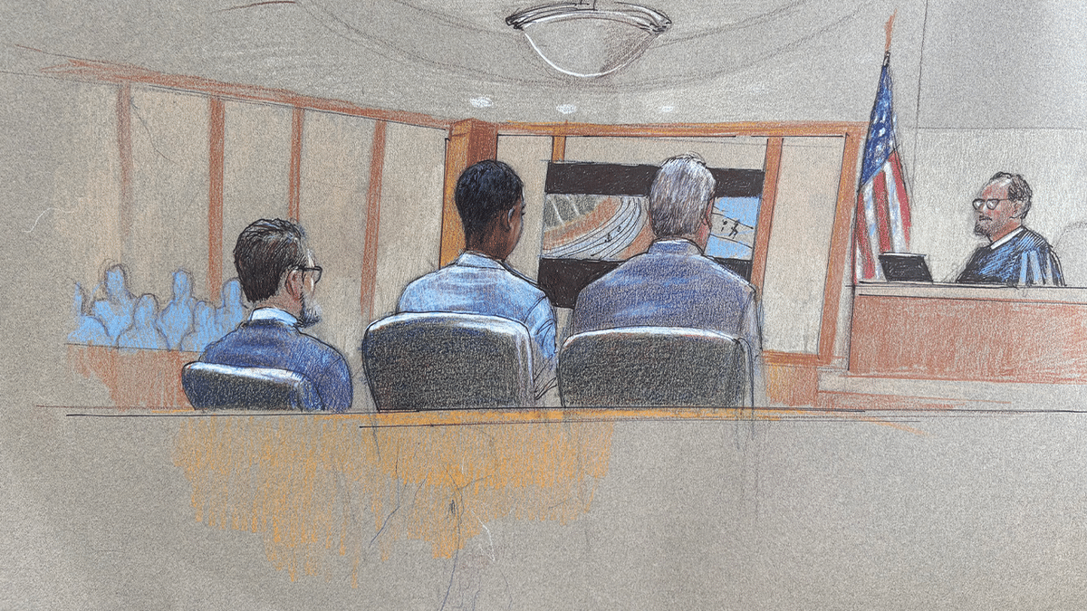 Courtroom sketch shows Karmelo Anthony seated with attorneys as surveillance video is presented during his murder trial in the fatal stabbing of Austin Metcalf at a Texas high school track meet