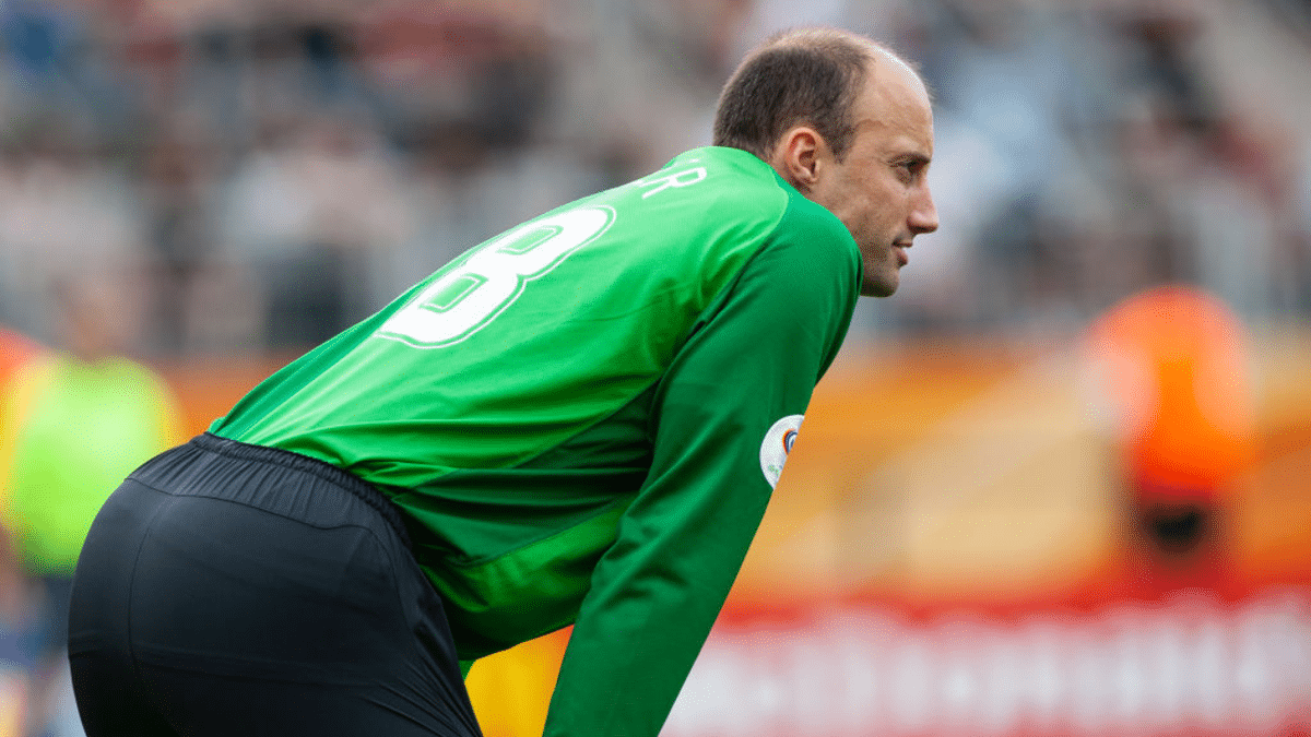 Kasey Keller the goalie for the USA team standing in goal during a soccer match.