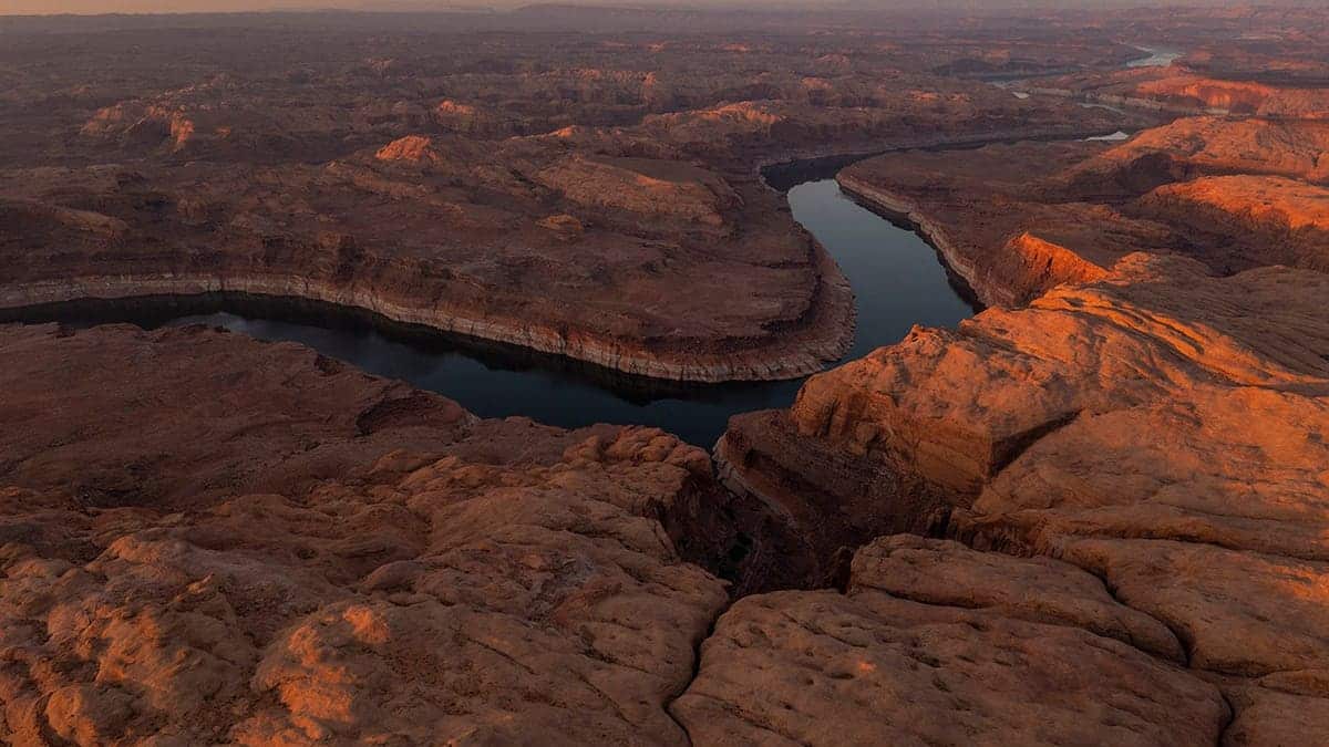 Lake Powell showing light colored bathtub ring from aerial view near Glen Canyon National Recreation Area Utah