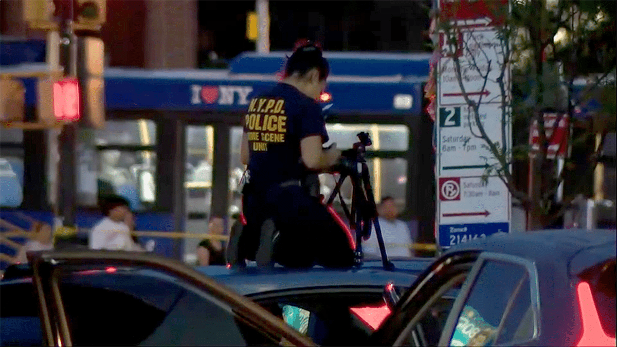 A cop on a police car in the Bronx