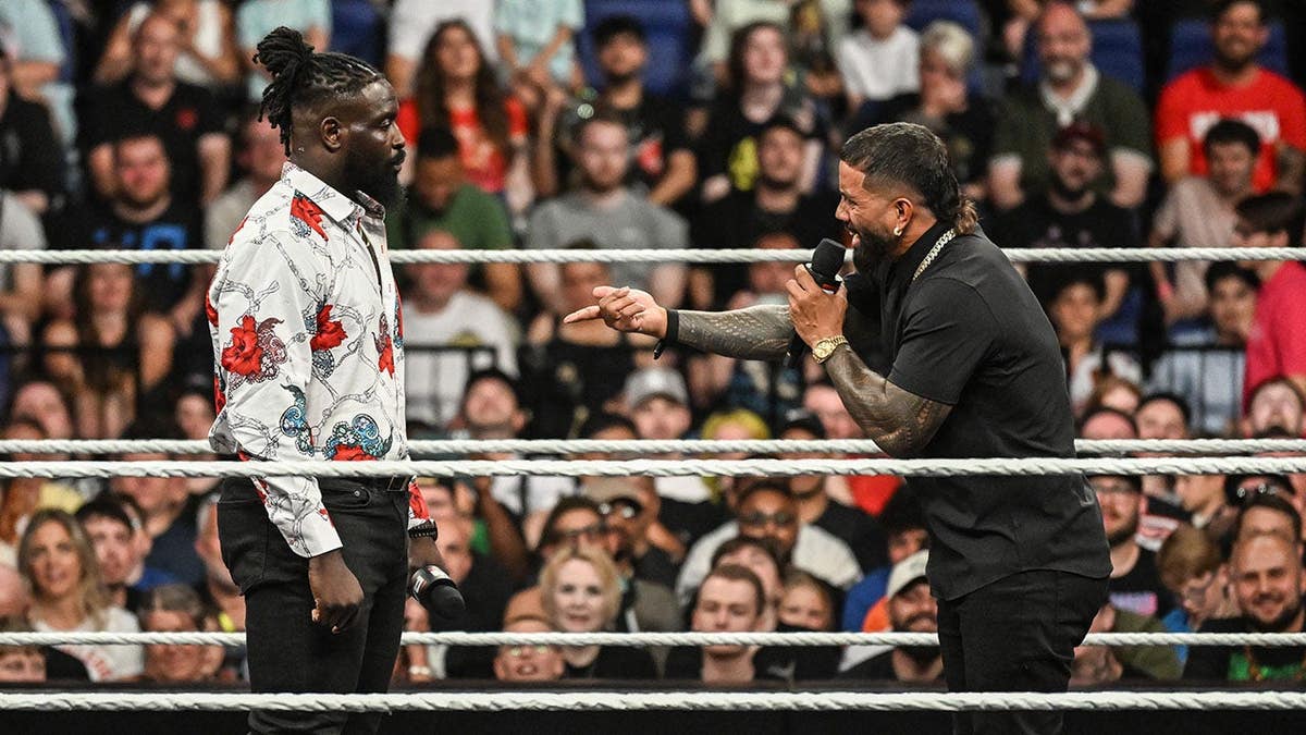 Oba Femi and Jey Uso speaking in the ring during Monday Night RAW at The O2 Arena in London